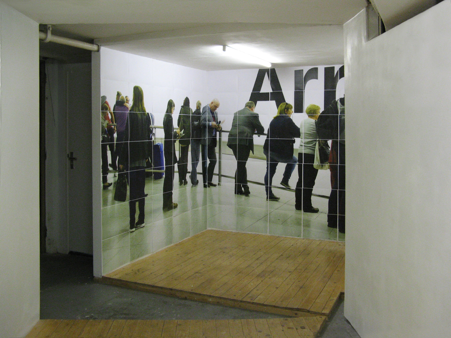 Mirrored wall installation with large type and visitors, Werkplaats Typografie, Arnhem